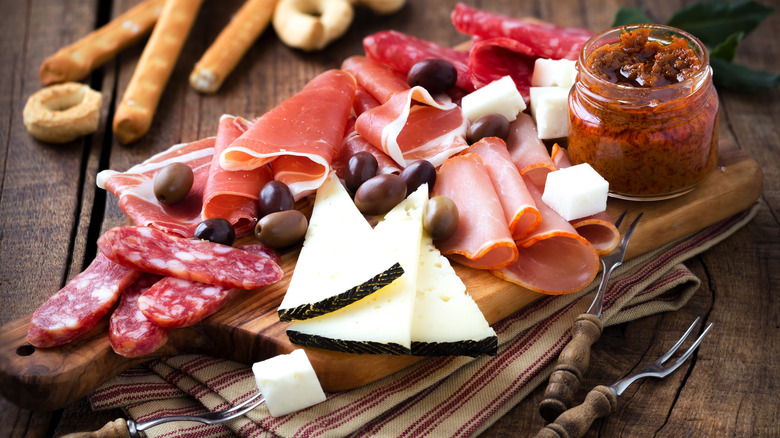 cured meat on a wooden board