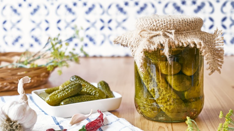 pickled cucumbers in a jar
