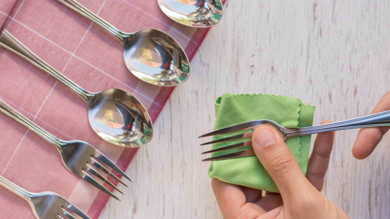 polishing silverware