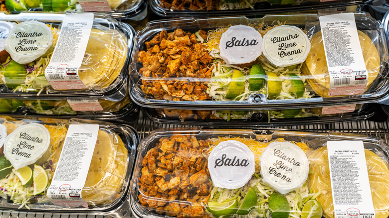 Costco's ready-made Chicken Street Tacos kits are stacked in a display.
