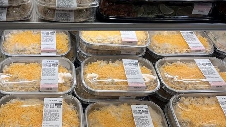 Ready-made Mac and Cheese meals are on display in Costco.