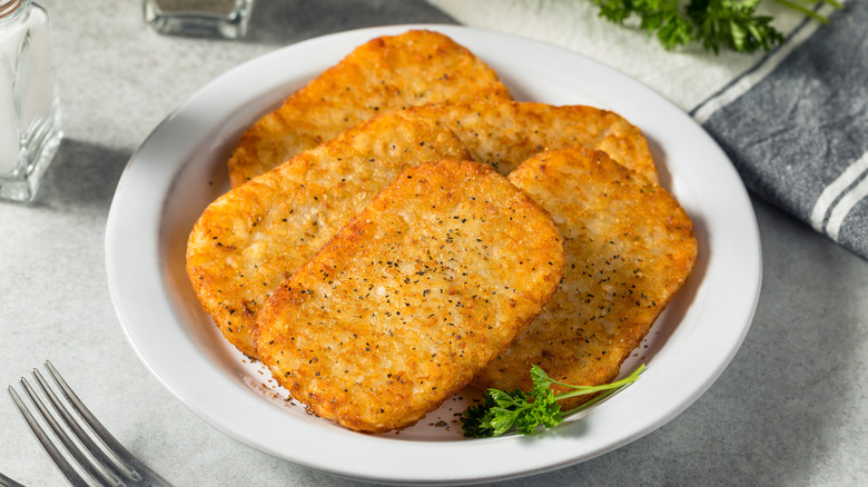 Hash brown patties on plate