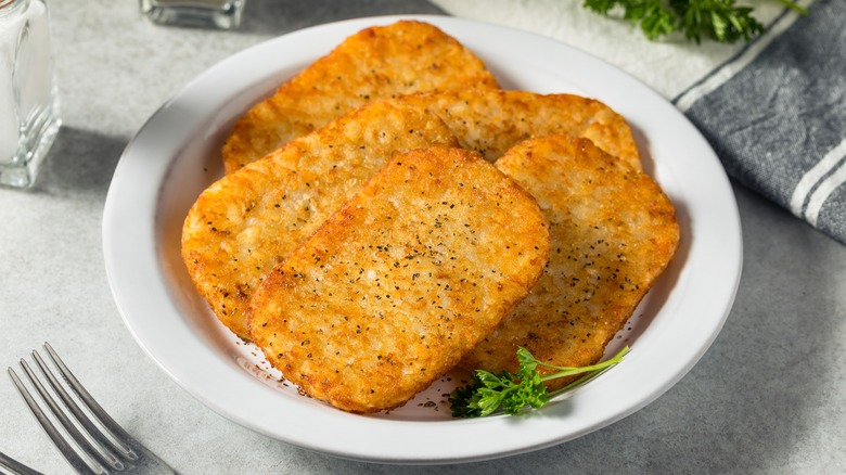 Hash brown patties on plate