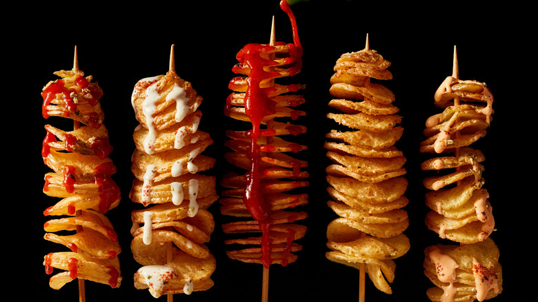 Skewered tornado fries with sauce