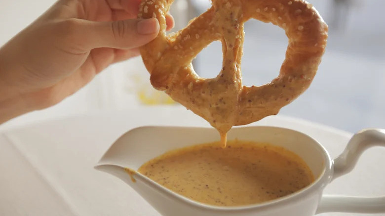 pretzel in mustard sauce