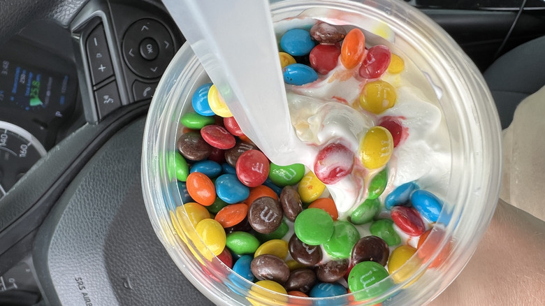 Top view of an M&M's McFlurry with the now-retired McFlurry spoon.