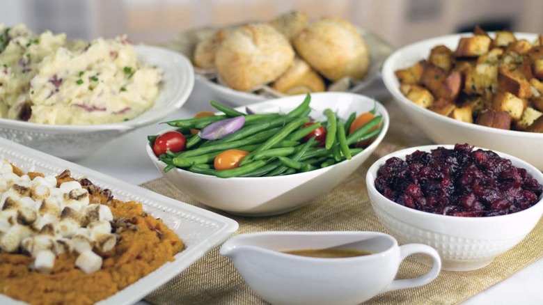 White dishes with the various Thanksgiving sides available from The Capital Grille