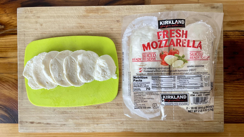 Overhead view of Kirkland Signature Fresh Mozzarella on a cutting board