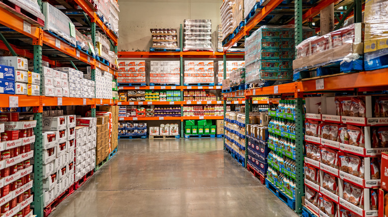 The interior of a Costco, specfically an aisle with pantry goods.