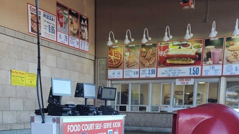 A food court self-serve kiosk sits just outside the pick-up windows at a Costco
