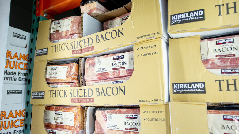 Kirkland brand thick sliced bacon sold from bulk boxes in Costco's refrigeration section