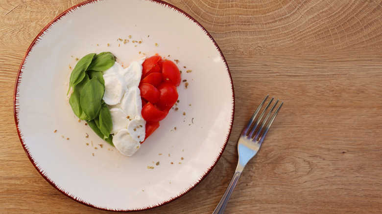 tomato, mozzarella and basil in heart shape