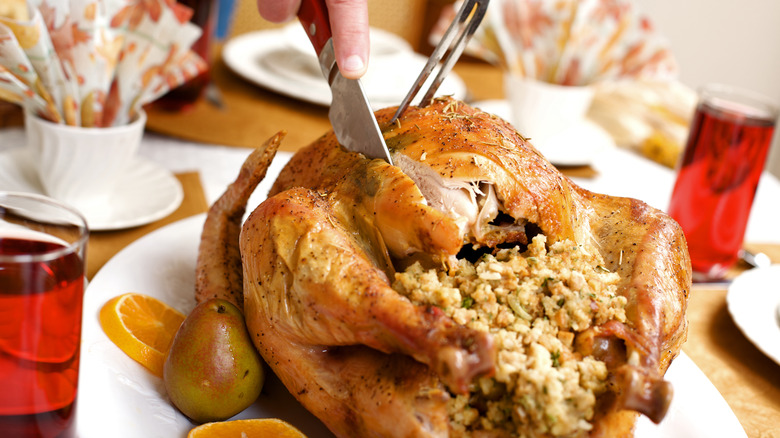 roast turkey with stuffing spilling out