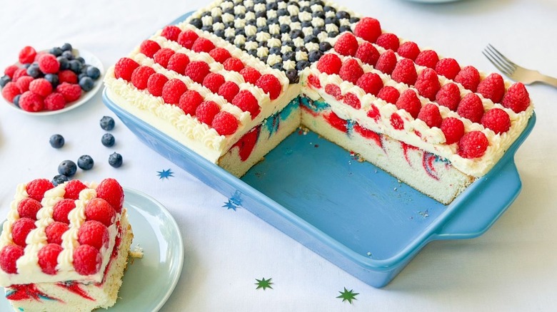 4th of July American flag cake cut to show red and blue marbled interior