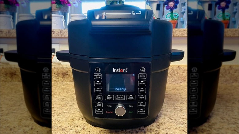 Instant pot air fryer appliance on a countertop.