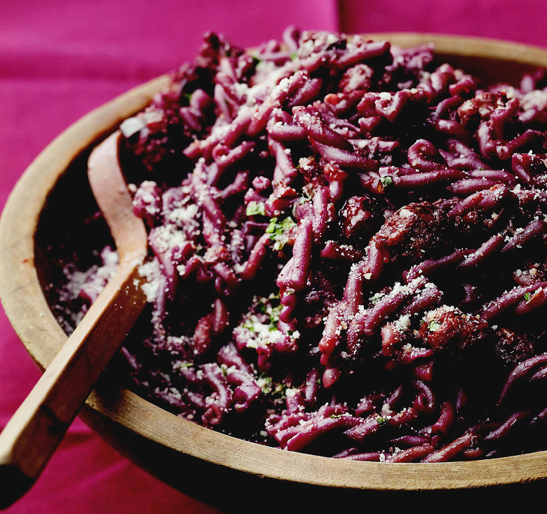 Boiling pasta in wine gives it an oh-so-lovely hue sure to charm the pants off a date. Reason #193 to stay in and cook.