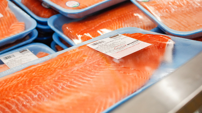 A view of several packages of Kirkland Signature farm raised steelhead salmon fillets, on display at a local Costco store.