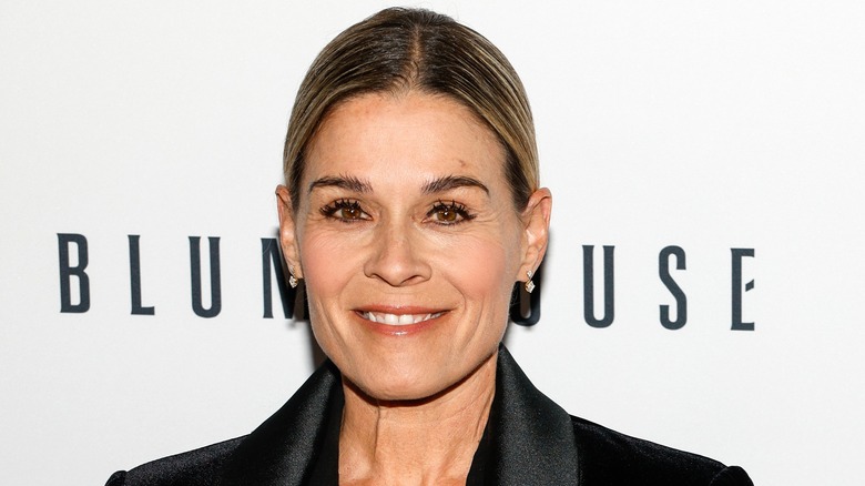 Cat Cora smiling at event
