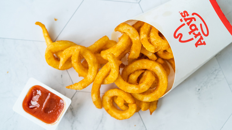 Arby's curly fries and ketchup.