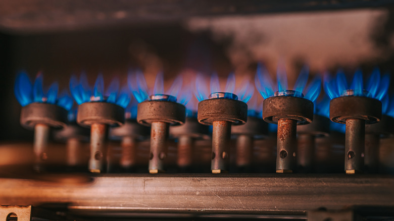Multiple gas burners underneath an appliance