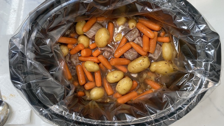 Crock-pot filled with a liner.