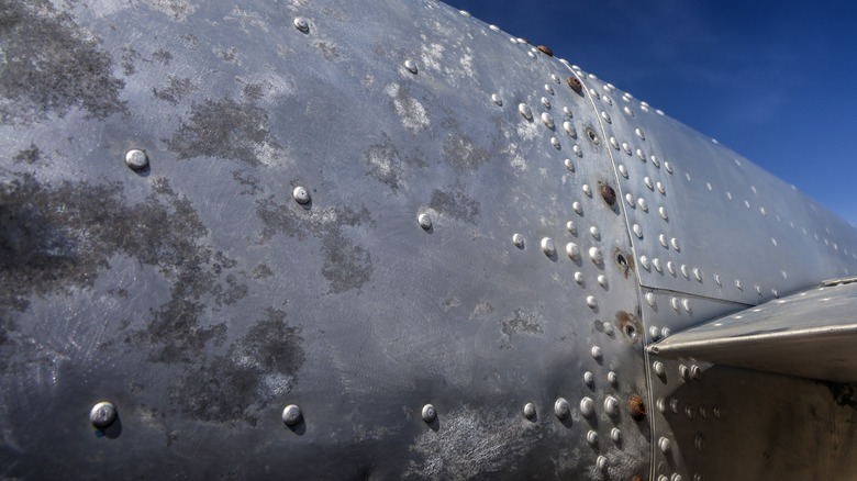 A corroded, aluminum fuselage