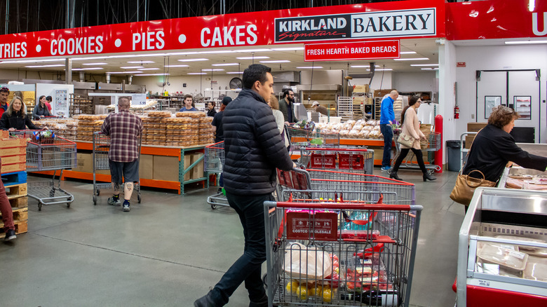 Shoppers in Costco bakery section