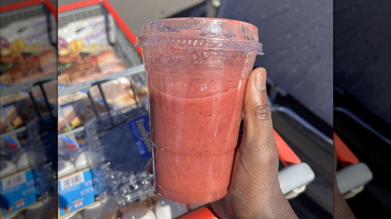close up image of a triple berry smoothie in a glass