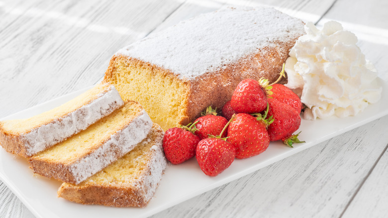 Pound cake with strawberries and whipped cream.