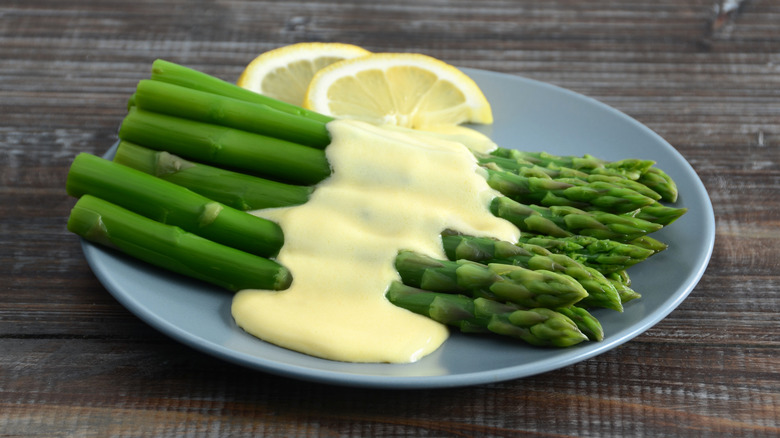 Asparagus finished with hollandaise.