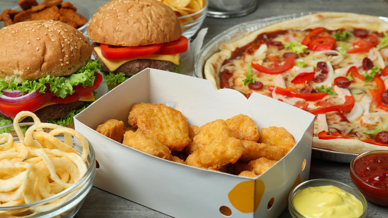Different fast food items on a gray table