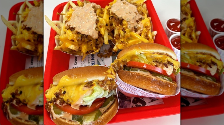 Two animal-style grilled cheese sandwiches and two animal fries from In-N-Out.