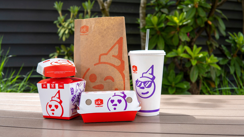 A Jack in the Box meal on a table outside.