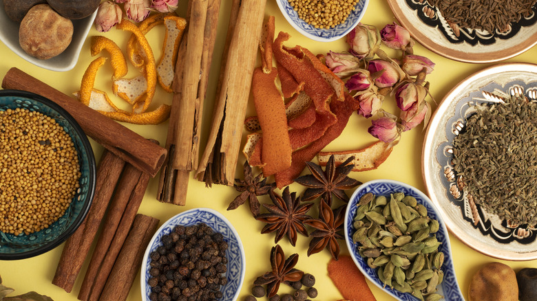 Spices, citrus peels, and dried roses