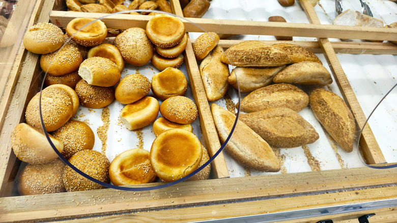 Fresh baked bread rolls at a grocery store