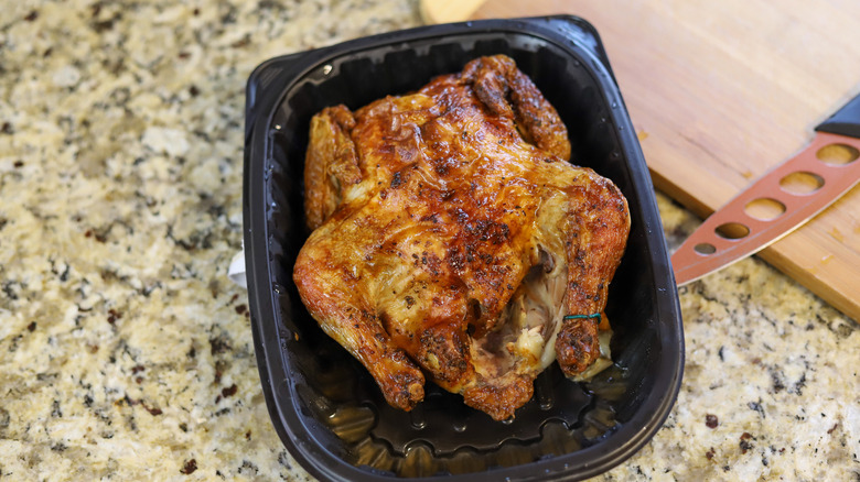 Rotisserie chicken on a kitchen counter