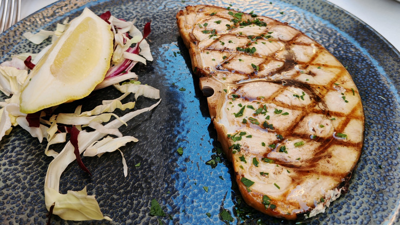 A plate with swordfish.