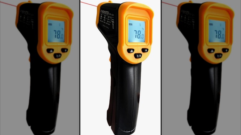 A digital infrared thermometer gun with laser