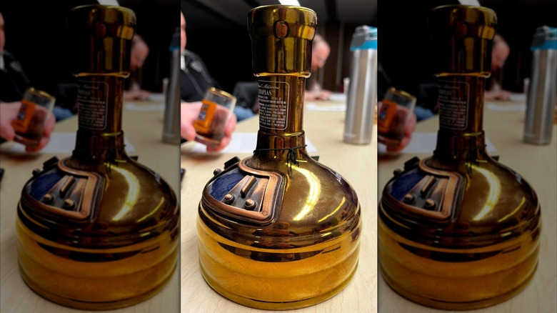 A bottle of Sam Adam's Utopia.