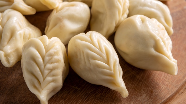 Cooked pì fasacc' on wooden plate