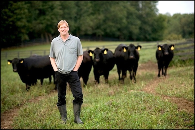 Chef Spike Gjerde hangs out with his happy cows.
