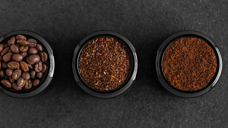 Whole coffee beans and coffee grounds