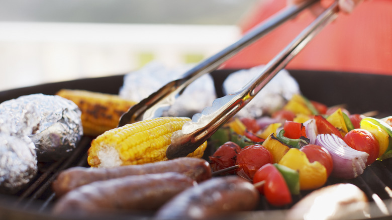 winter grill kebabs, corn, and sausages