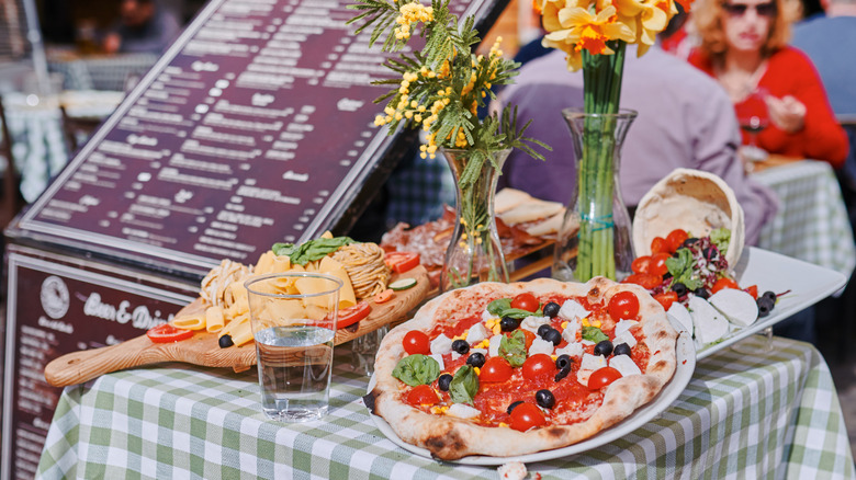 Food displayed outside of Roman restaurant.