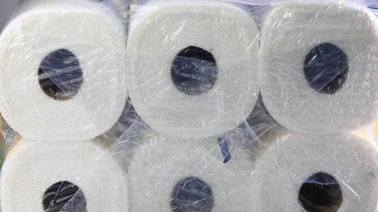six paper towel rolls in a package