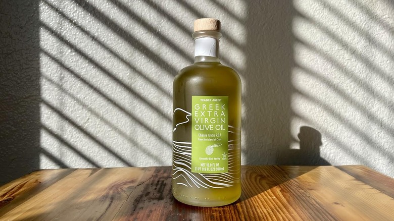 Bottle of Trader Joe's Greek Extra Virgin Olive Oil on a wooden table