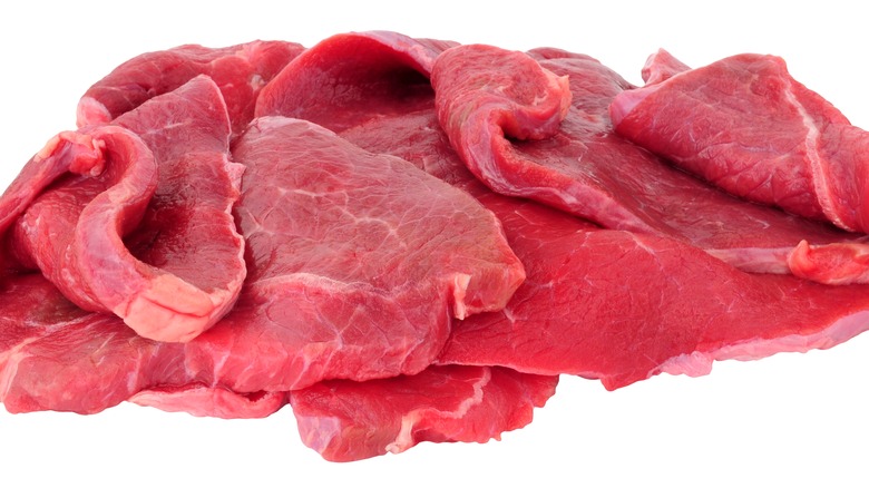 sizzle steaks on white background