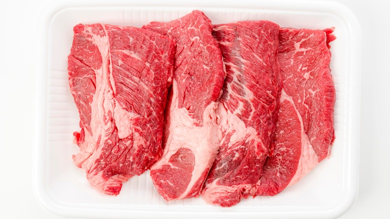 chuck eye steaks white background