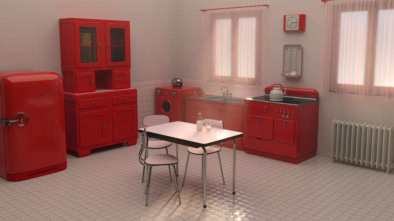 1950s-style kitchen with red applicances and cabinets