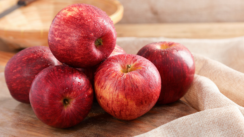 apples on a wooden board